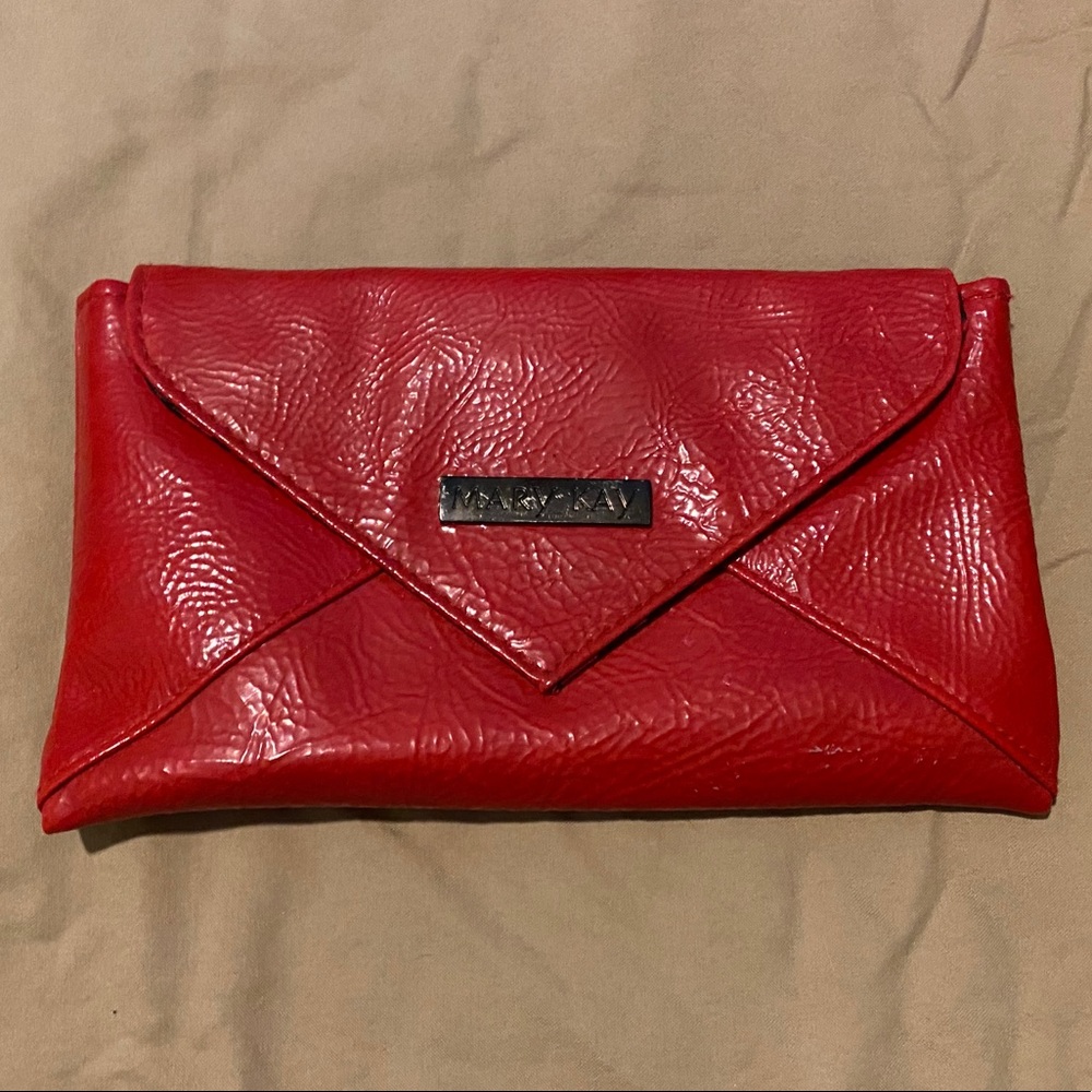 Red Marykay clutch with lipgloss keychain